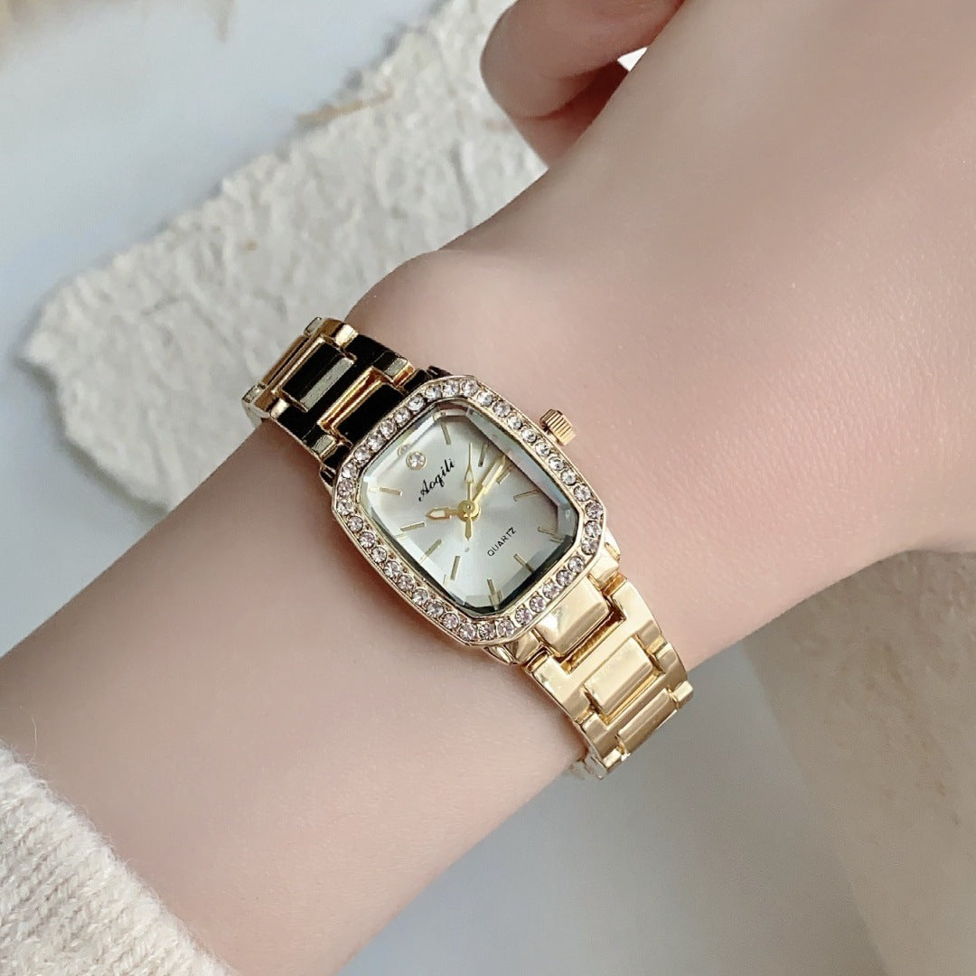 Montre femme Éclat Carré dorée cadran blanc