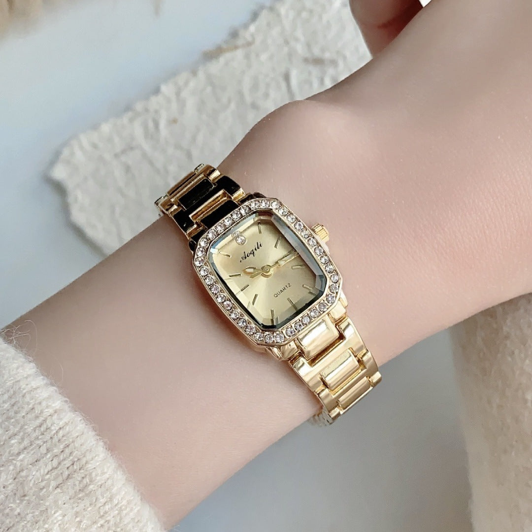 Montre femme Éclat Carré dorée cadran champagne