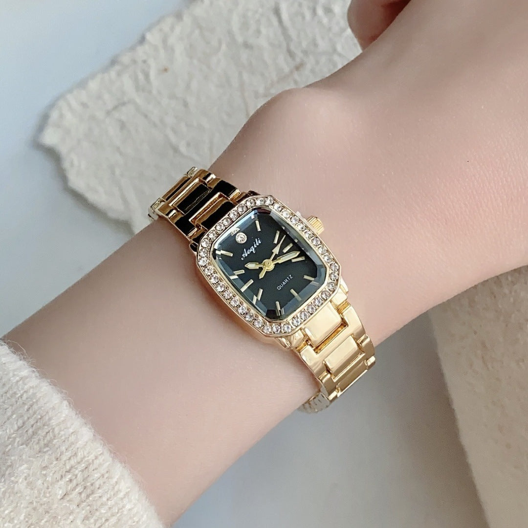Montre femme Éclat Carré dorée cadran noir